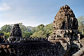 Angkor Thom - Bayon temple, second enclosure, corner towers seen from the central terrace 